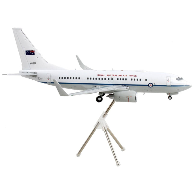 https://cdn.shopify.com/s/files/1/0504/9925/6496/products/boeing-737-700-transport-aircraft-royal-australian-air-force-a36-002-white-and-gray-gemini-200-series-1200-diecast-model-airplane-by-geminijets-608247.jpg?v=1748420674