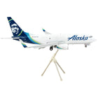 https://cdn.shopify.com/s/files/1/0504/9925/6496/products/boeing-737-700bdsf-commercial-aircraft-with-flaps-down-alaska-air-cargo-white-with-blue-tail-gemini-200-series-1200-diecast-model-airplane-by-geminijets-559013.jpg?v=1748420743