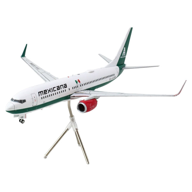 https://cdn.shopify.com/s/files/1/0504/9925/6496/files/boeing-737-800-commercial-aircraft-mexicana-xa-asm-white-with-green-stripes-gemini-200-series-1200-diecast-model-airplane-by-geminijets-688713.jpg?v=1748405265