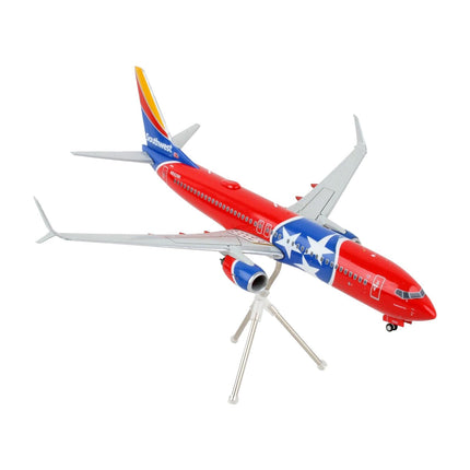 https://cdn.shopify.com/s/files/1/0504/9925/6496/products/boeing-737-800-commercial-aircraft-southwest-airlines-tennessee-one-tennessee-flag-livery-gemini-200-series-1200-diecast-model-airplane-by-geminijets-265308.jpg?v=1748420745