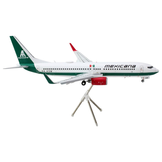 https://cdn.shopify.com/s/files/1/0504/9925/6496/files/boeing-737-800-commercial-aircraft-with-flaps-down-mexicana-xa-asm-white-with-green-stripes-gemini-200-series-1200-diecast-model-airplane-by-geminijets-473771.jpg?v=1748405277