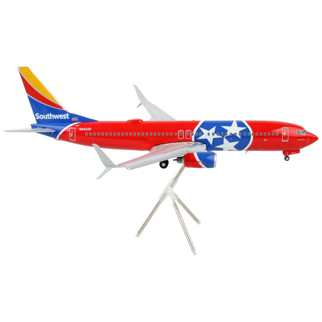 https://cdn.shopify.com/s/files/1/0504/9925/6496/products/boeing-737-800-commercial-aircraft-with-flaps-down-southwest-airlines-tennessee-one-tennessee-flag-livery-gemini-200-series-1200-diecast-model-airplane-by-gemin-717428.jpg?v=1748420742