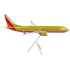 https://cdn.shopify.com/s/files/1/0504/9925/6496/products/boeing-737-max-8-commercial-aircraft-southwest-airlines-gold-and-red-gemini-200-series-1200-diecast-model-airplane-by-geminijets-511519.jpg?v=1748420744
