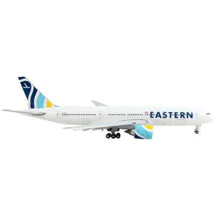 https://cdn.shopify.com/s/files/1/0504/9925/6496/products/boeing-777-200er-commercial-aircraft-with-flaps-down-eastern-air-lines-white-with-striped-tail-1400-diecast-model-airplane-by-geminijets-907610.jpg?v=1748420745