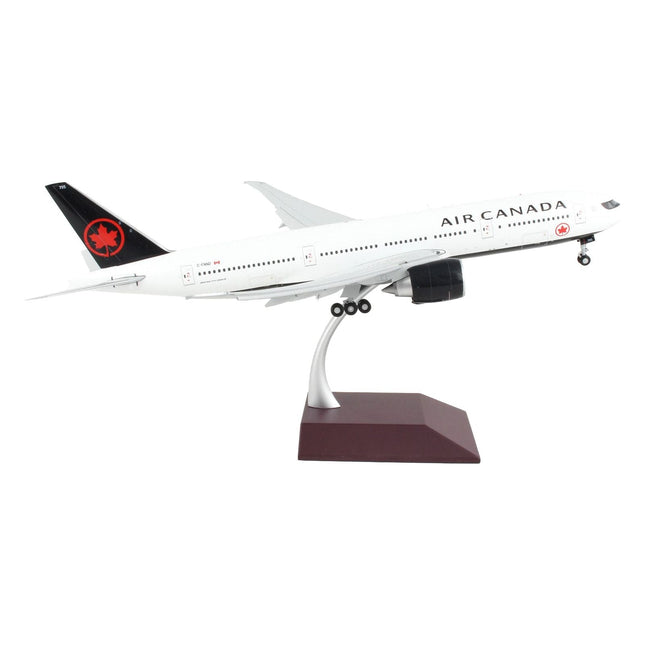 https://cdn.shopify.com/s/files/1/0504/9925/6496/products/boeing-777-200lr-commercial-aircraft-with-flaps-down-air-canada-white-with-black-tail-gemini-200-series-1200-diecast-model-airplane-by-geminijets-358063.jpg?v=1748420658
