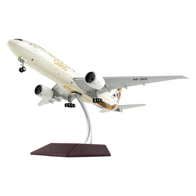 https://cdn.shopify.com/s/files/1/0504/9925/6496/products/boeing-777f-commercial-aircraft-etihad-airways-cargo-beige-with-tail-graphics-gemini-200-interactive-series-1200-diecast-model-airplane-by-geminijets-397396.jpg?v=1748420673