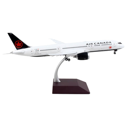 https://cdn.shopify.com/s/files/1/0504/9925/6496/products/boeing-787-9-commercial-aircraft-with-flaps-down-air-canada-white-with-black-tail-gemini-200-series-1200-diecast-model-airplane-by-geminijets-237098.jpg?v=1748420659