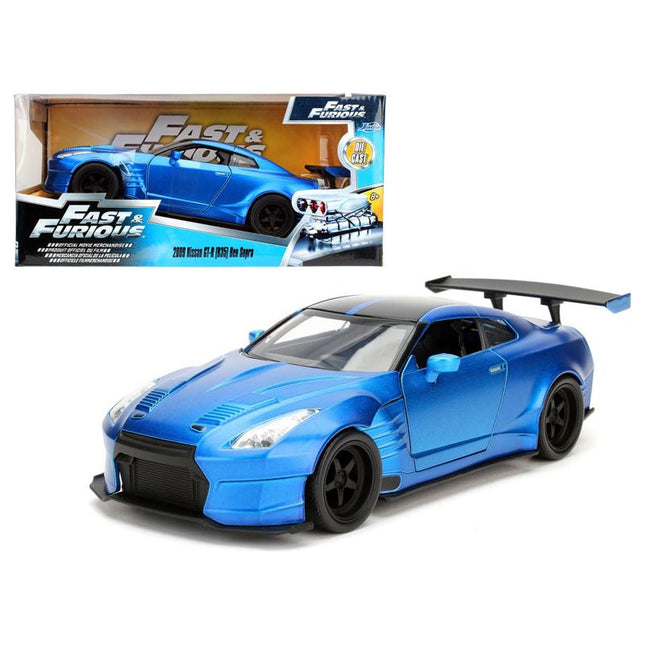 https://cdn.shopify.com/s/files/1/0504/9925/6496/files/brians-2009-nissan-gtr-r35-blue-ben-sopra-fast-furious-movie-124-diecast-model-car-by-jada-974777.jpg?v=1748419485