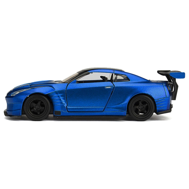https://cdn.shopify.com/s/files/1/0504/9925/6496/files/brians-2009-nissan-gtr-r35-blue-ben-sopra-fast-furious-movie-132-diecast-model-car-by-jada-572564.jpg?v=1748405108