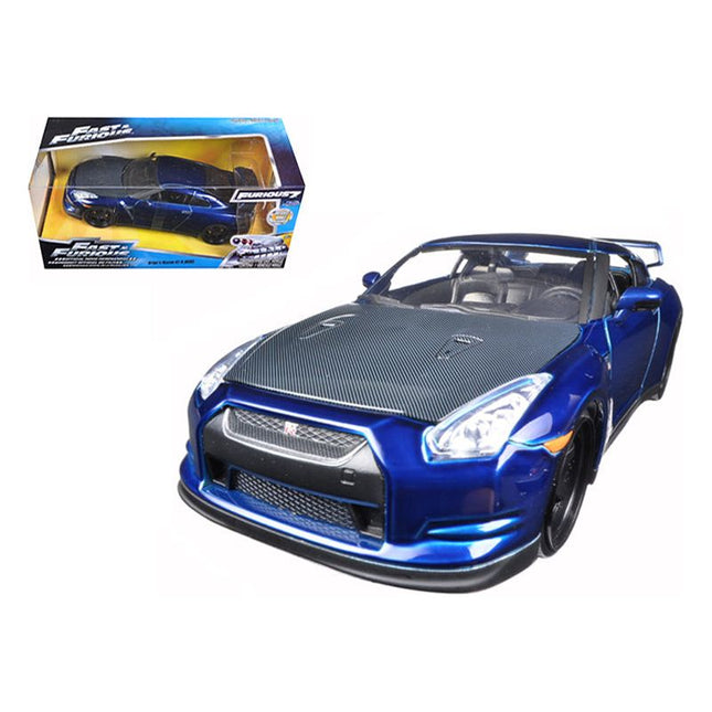 https://cdn.shopify.com/s/files/1/0504/9925/6496/files/brians-2009-nissan-gtr-r35-blue-fast-furious-7-movie-124-diecast-model-car-by-jada-283947.jpg?v=1748419547