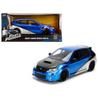 https://cdn.shopify.com/s/files/1/0504/9925/6496/files/brians-subaru-impreza-wrx-sti-blue-and-silver-with-carbon-hood-fast-furious-movie-124-diecast-model-car-by-jada-936721.jpg?v=1748419550