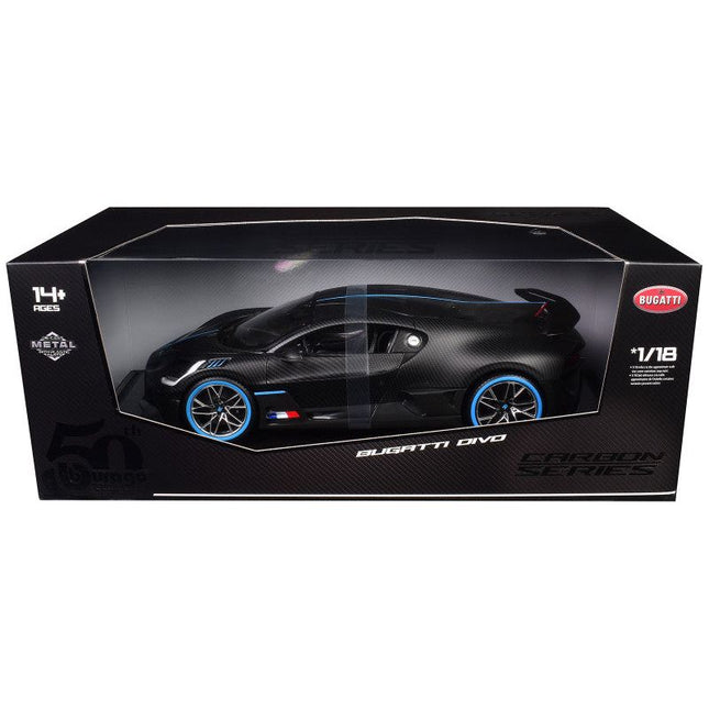 https://cdn.shopify.com/s/files/1/0504/9925/6496/files/bugatti-divo-carbon-fiber-with-blue-accents-carbon-series-bburago-50th-anniversary-118-diecast-model-car-by-bburago-969452.jpg?v=1748403382