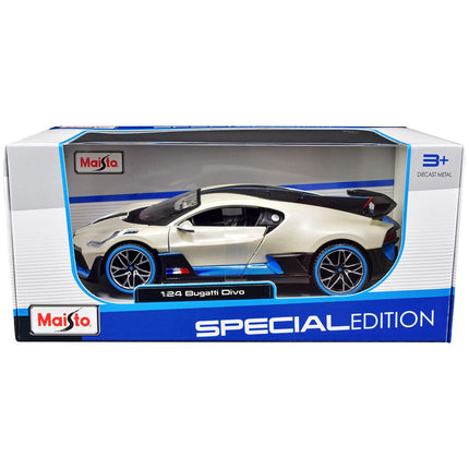 https://cdn.shopify.com/s/files/1/0504/9925/6496/files/bugatti-divo-satin-white-metallic-with-carbon-and-blue-accents-special-edition-124-diecast-model-car-by-maisto-106560.jpg?v=1748418494