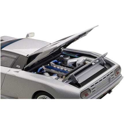 https://cdn.shopify.com/s/files/1/0504/9925/6496/files/bugatti-eb110-gt-silver-118-diecast-car-model-by-autoart-595327.jpg?v=1748416528
