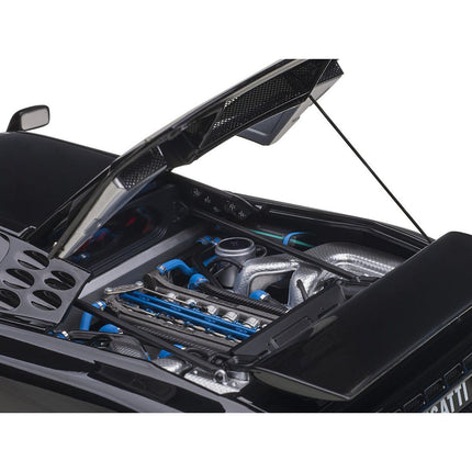 https://cdn.shopify.com/s/files/1/0504/9925/6496/files/bugatti-eb110-ss-super-sport-nero-vernice-black-with-red-interior-and-silver-wheels-118-model-car-by-autoart-271137.jpg?v=1756087379