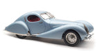 1:18 scale blue diecast vintage coupe model car with curved body and red interior