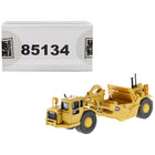 https://cdn.shopify.com/s/files/1/0504/9925/6496/products/cat-caterpillar-627g-wheeled-scraper-tractor-with-operator-high-line-series-187-ho-scale-diecast-model-by-diecast-masters-965836.jpg?v=1748421197