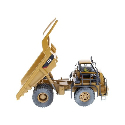 https://cdn.shopify.com/s/files/1/0504/9925/6496/products/cat-caterpillar-770-off-highway-truck-yellow-weathered-with-operator-weathered-series-150-diecast-model-by-diecast-masters-105973.jpg?v=1748421073