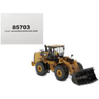 https://cdn.shopify.com/s/files/1/0504/9925/6496/products/cat-caterpillar-966m-wheel-loader-with-operator-dirty-version-weathered-series-150-diecast-model-by-diecast-masters-964520.jpg?v=1748421115