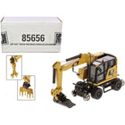https://cdn.shopify.com/s/files/1/0504/9925/6496/products/cat-caterpillar-m323f-railroad-wheeled-excavator-with-3-accessories-cat-yellow-version-high-line-series-187-ho-scale-diecast-model-by-diecast-masters-524376.jpg?v=1748421195