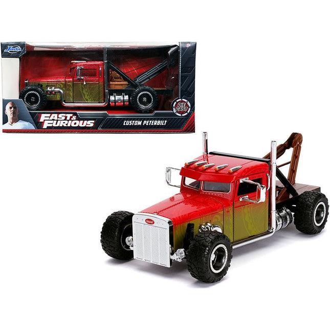 https://cdn.shopify.com/s/files/1/0504/9925/6496/files/custom-peterbilt-tow-truck-fast-furious-series-124-diecast-model-by-jada-372703.jpg?v=1748419599