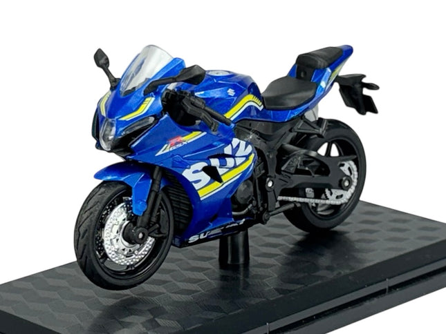 1:18 scale blue sport motorcycle diecast model with yellow graphics on display stand
