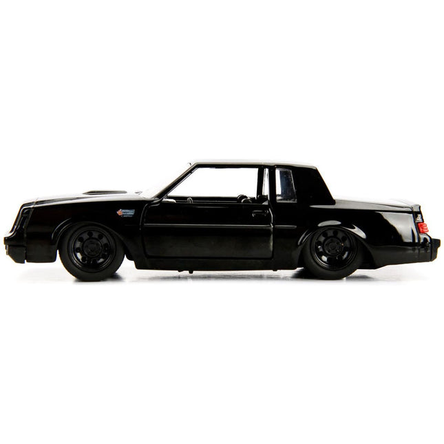https://cdn.shopify.com/s/files/1/0504/9925/6496/files/doms-buick-grand-national-black-fast-furious-movie-132-diecast-model-car-by-jada-276507.jpg?v=1748419129