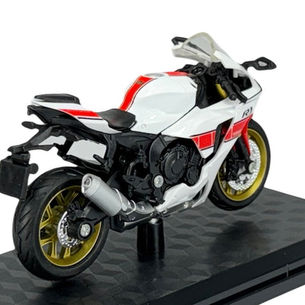 1:18 scale diecast model of white and red sport motorcycle with gold wheels on display stand