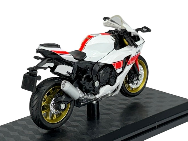 1:18 scale diecast model of white and red sport motorcycle with gold wheels on display stand