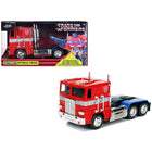 https://cdn.shopify.com/s/files/1/0504/9925/6496/files/g1-autobot-optimus-prime-truck-red-with-robot-on-chassis-from-transformers-tv-series-hollywood-rides-series-132-diecast-model-by-jada-121235.jpg?v=1748419020