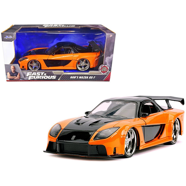 https://cdn.shopify.com/s/files/1/0504/9925/6496/files/hans-mazda-rx-7-rhd-right-hand-drive-orange-and-black-fast-furious-movie-124-diecast-model-car-by-jada-772892.jpg?v=1748419487