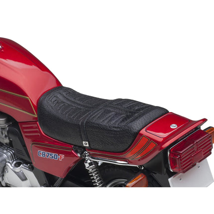 https://cdn.shopify.com/s/files/1/0504/9925/6496/files/honda-cb750f-motorcycle-red-with-helmet-baribari-legend-1986-ova-112-model-by-autoart-154688.jpg?v=1760624539