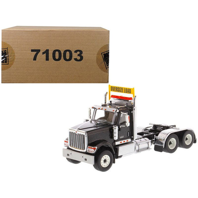 https://cdn.shopify.com/s/files/1/0504/9925/6496/products/international-hx520-day-cab-tandem-tractor-black-150-diecast-model-by-diecast-masters-394034.jpg?v=1748421209