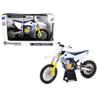 https://cdn.shopify.com/s/files/1/0504/9925/6496/files/husqvarna-fc450-white-and-blue-112-diecast-motorcycle-model-by-new-ray-659532.jpg?v=1760624524