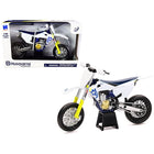 https://cdn.shopify.com/s/files/1/0504/9925/6496/files/husqvarna-fs450-white-and-blue-112-diecast-motorcycle-model-by-new-ray-869385.jpg?v=1760624547