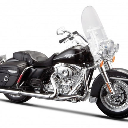 1:18 scale black diecast touring motorcycle model with saddlebags and clear windshield