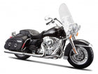 1:18 scale black diecast touring motorcycle model with saddlebags and clear windshield