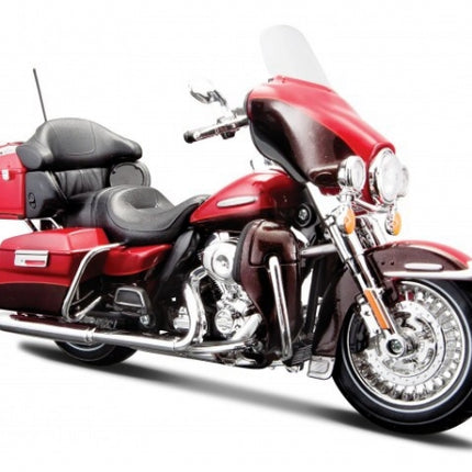Red and black diecast touring motorcycle model with chrome details and windshield