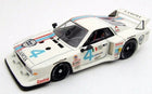 1:18 scale diecast Lancia rally race car model, white with blue and red stripes, racing livery