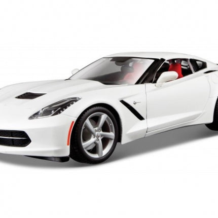 White diecast model sports car 1:18 scale with black accents and red interior