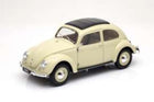 1:18 scale cream diecast classic car model with black roof on white background