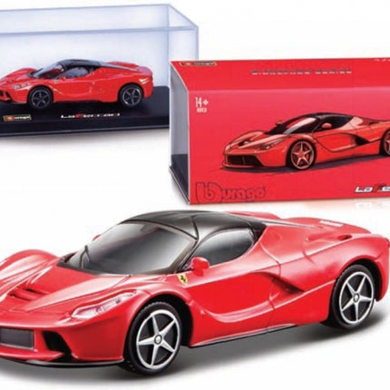 Red Ferrari diecast model car in display case with box, collectible 1:18 scale toy.