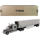 https://cdn.shopify.com/s/files/1/0504/9925/6496/products/international-lonestar-sleeper-cab-silver-with-53-reefer-refrigerated-chrome-plated-van-trailer-transport-series-150-diecast-model-by-diecast-masters-851225.jpg?v=1748421079