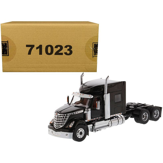 https://cdn.shopify.com/s/files/1/0504/9925/6496/products/international-lonestar-sleeper-cab-truck-tractor-black-150-diecast-model-by-diecast-masters-243830.jpg?v=1748421208