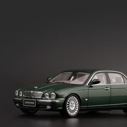 https://www.mydiecastcars.com/wp-content/uploads/2023/05/jaguar-green-almost-real-diecast.jpg