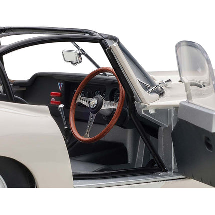 https://cdn.shopify.com/s/files/1/0504/9925/6496/files/jaguar-lightweight-e-type-roadster-rhd-right-hand-drive-white-118-model-car-by-autoart-747211.jpg?v=1748416457