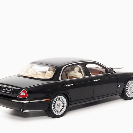 https://www.mydiecastcars.com/wp-content/uploads/2023/04/jaguar-xj6-black-almost-real-2.jpg