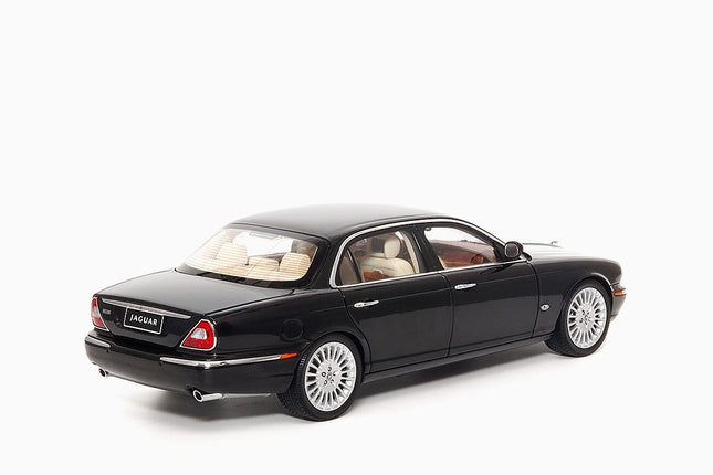 https://www.mydiecastcars.com/wp-content/uploads/2023/04/jaguar-xj6-black-almost-real-2.jpg