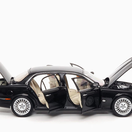 https://www.mydiecastcars.com/wp-content/uploads/2023/04/jaguar-xj6-black-almost-real-3.jpg