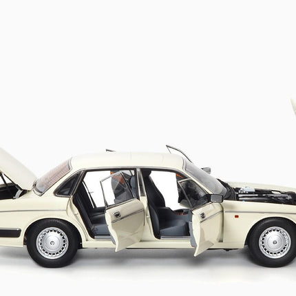 https://www.mydiecastcars.com/wp-content/uploads/2023/10/jaguar-xj6-white-almost-real-3.jpg